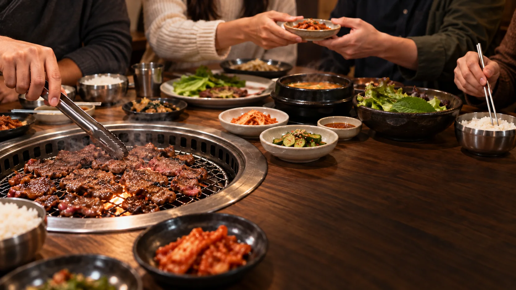 Friends sharing Korean BBQ around a table